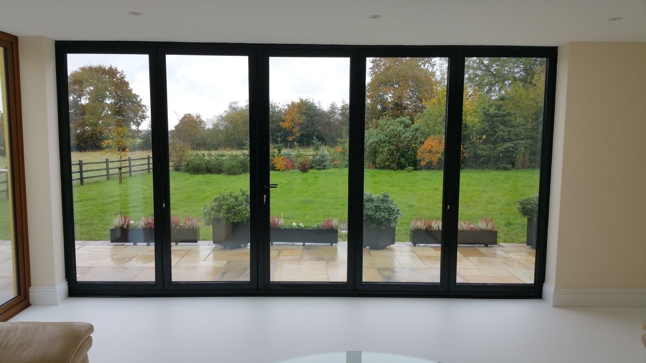 house with aluminium bi-folding doors