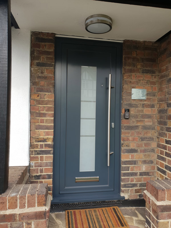 house with contemporary aluminium entrance doors